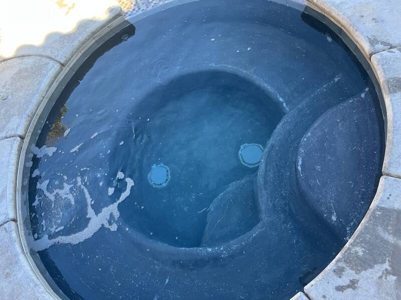 The same pool clear and blue after professional cleaning