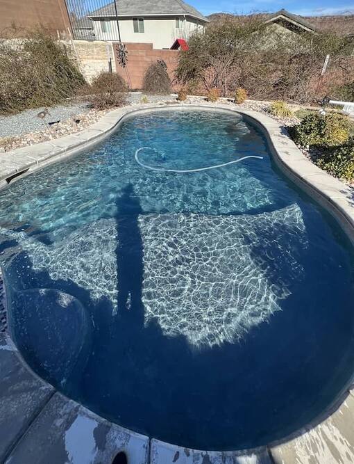 Clear blue pool water after chemical balancing