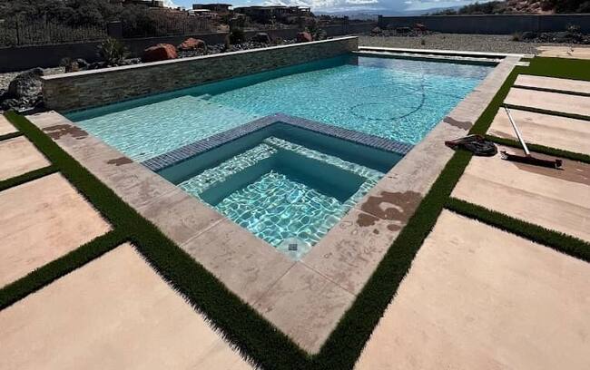 Clean backyard pool at dusk
