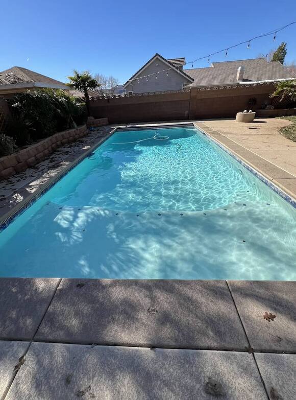 Clean residential pool maintained by The Pool Medic