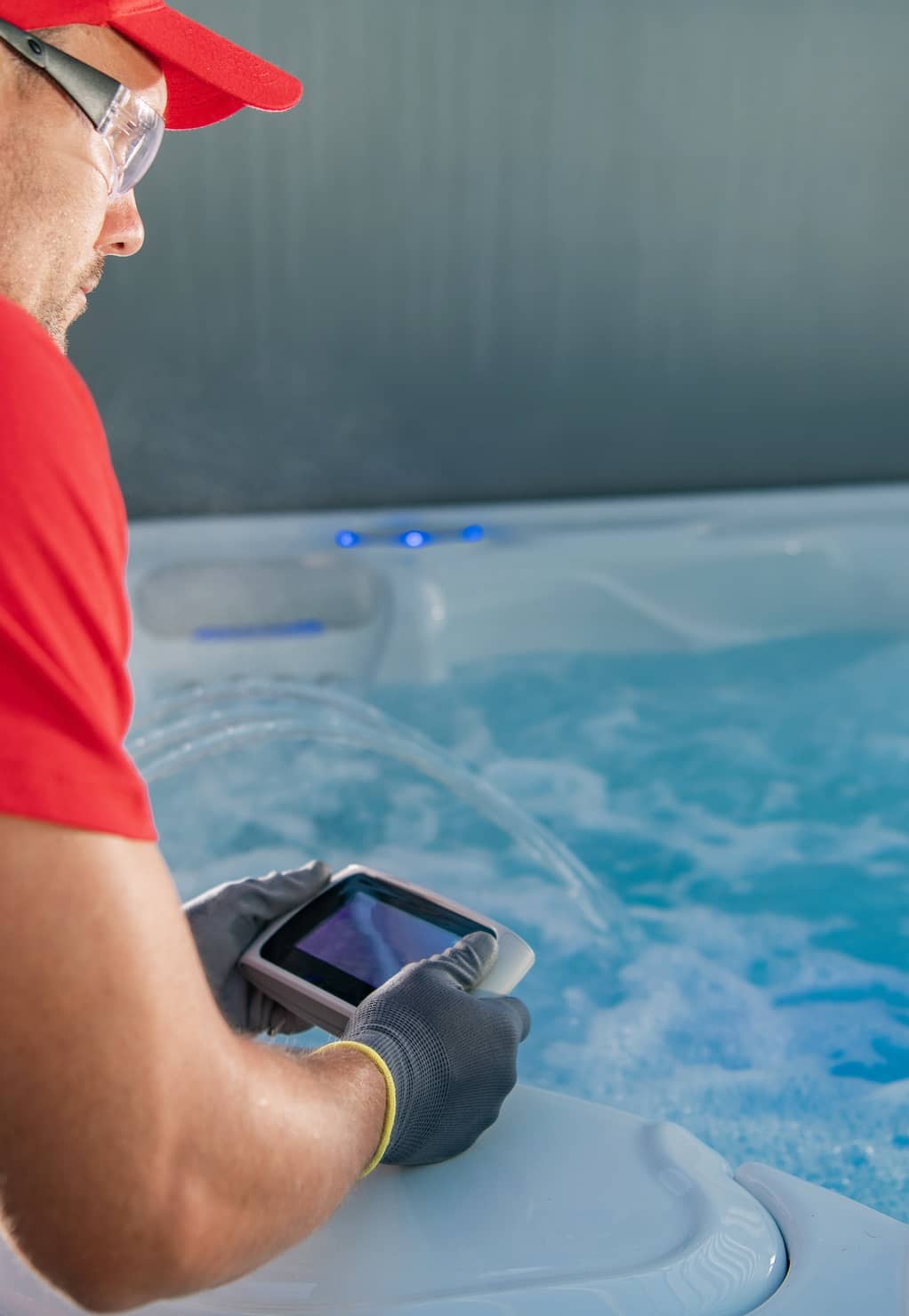 Spa Technician working on a spa