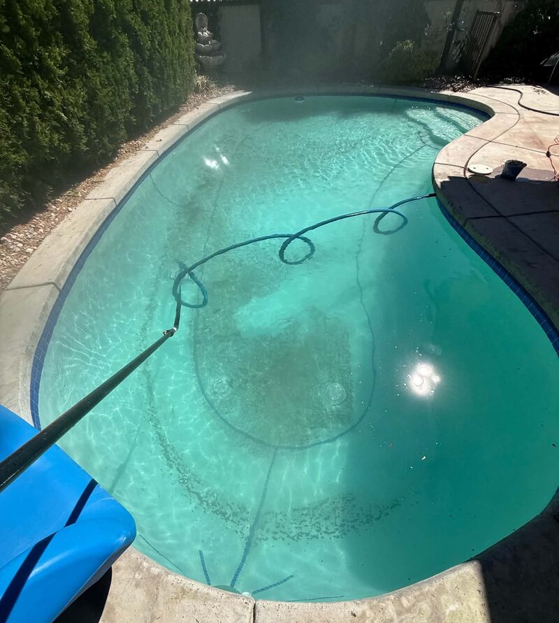 Green pool before cleaning by The Pool Medic in Ivins, Utah