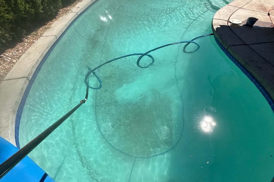 The same pool green and untreated before service
