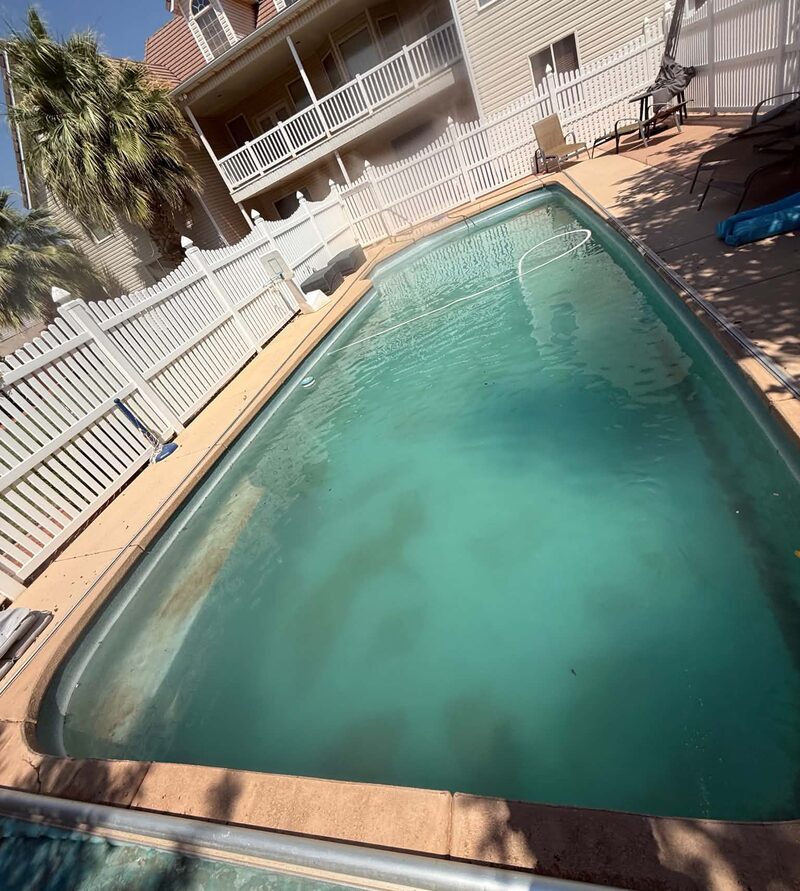 Green pool before cleaning by The Pool Medic in Santa Clara, Utah